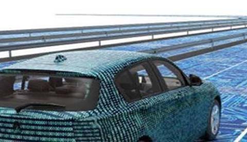 A car is driving on a highway