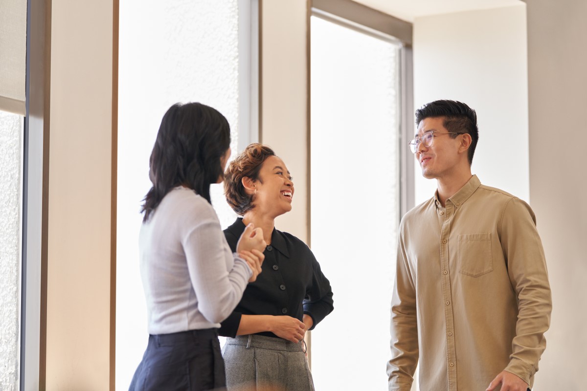 Three coworkers talking