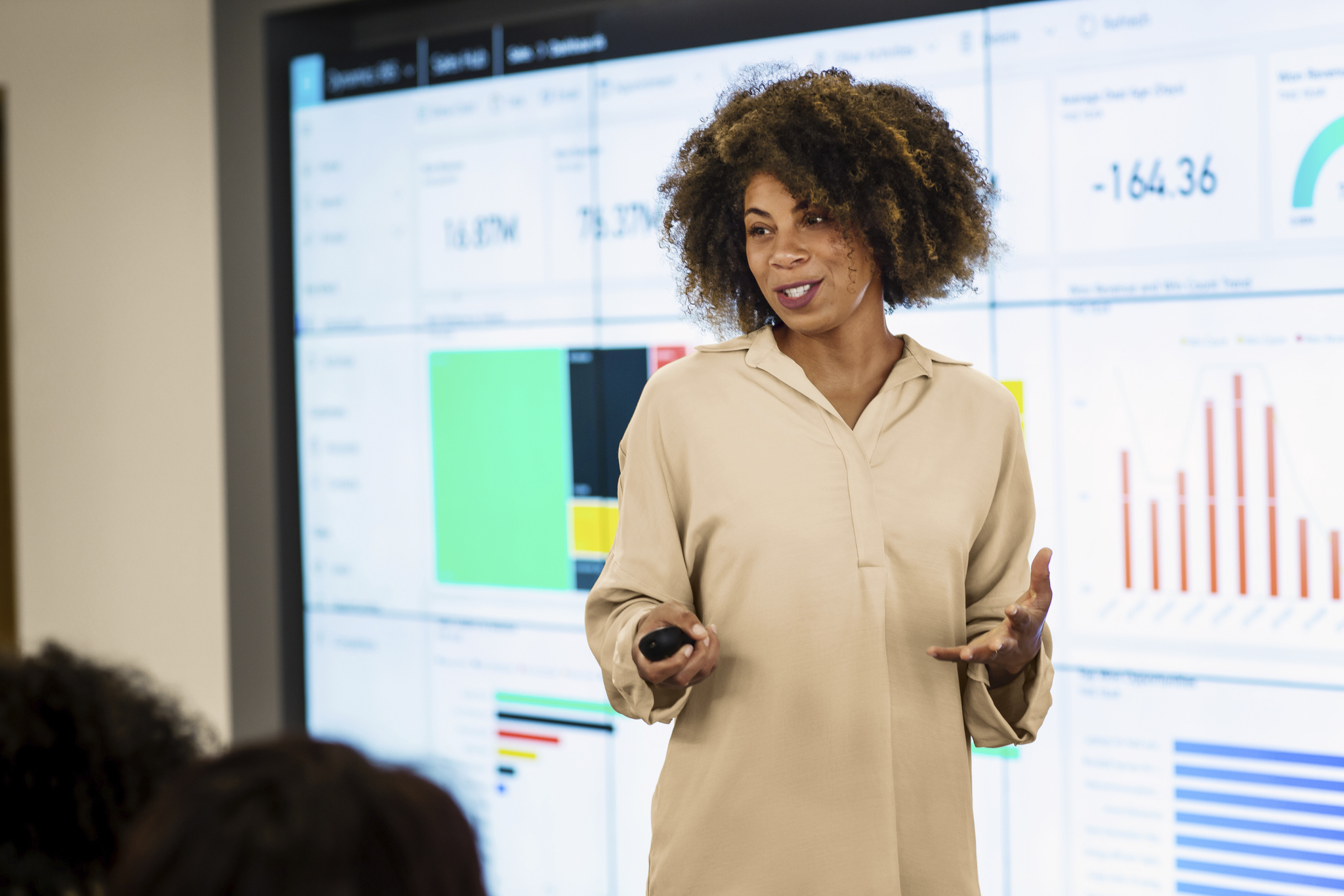 Business woman giving presentation on the Power Platform