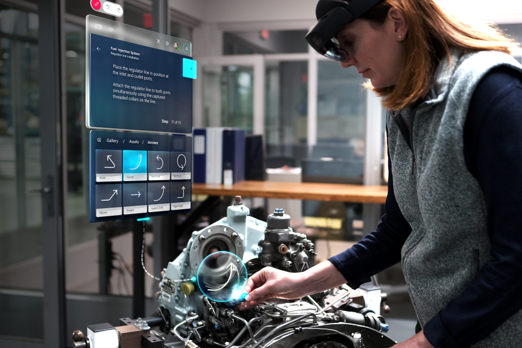 Woman using Dynamics 365 Guides with implied motion to assemble an engine