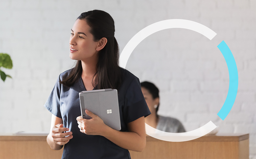 First line worker using Surface Go in medical office. Contextual first line worker
