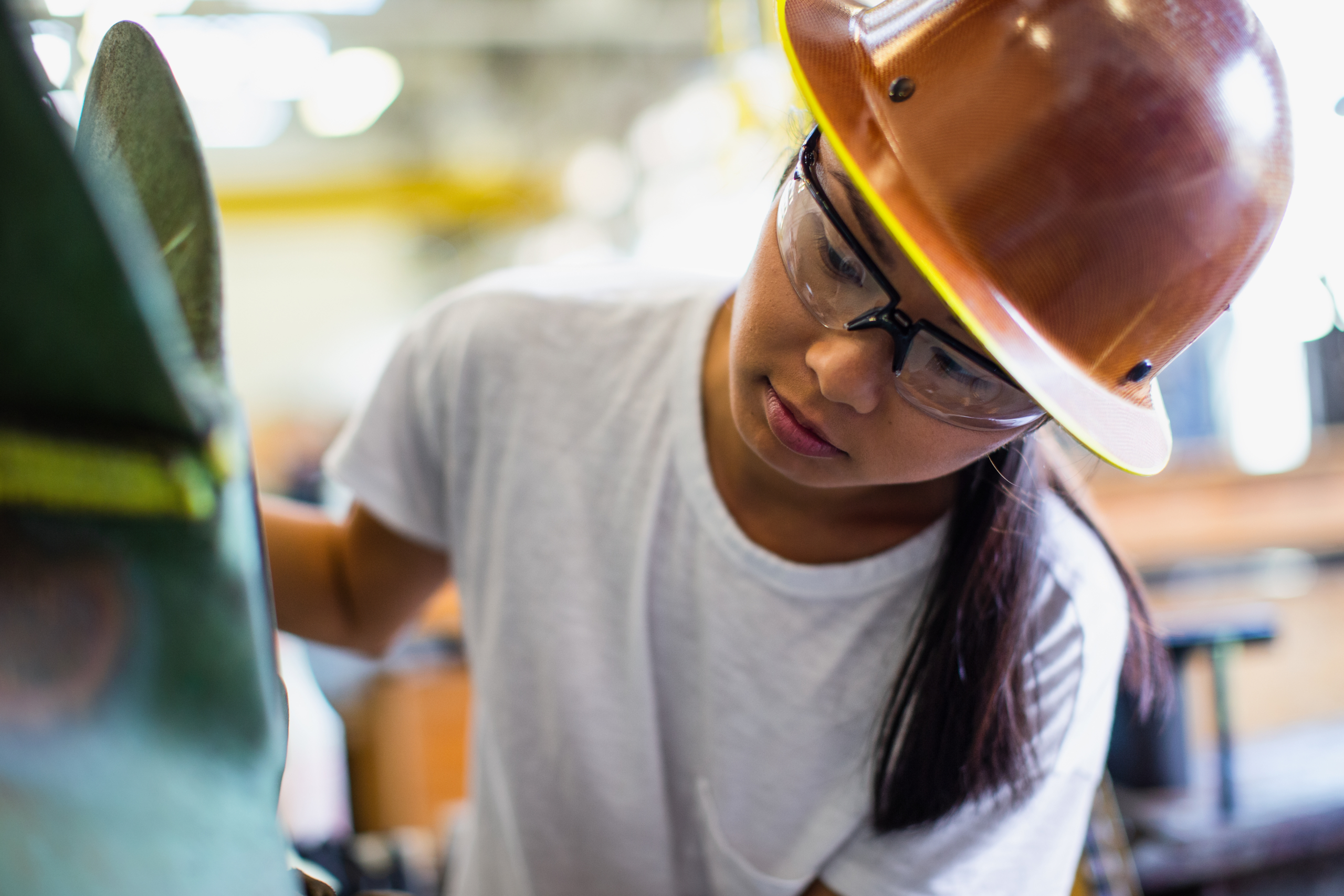 Female worker in shipbuilder‘s machine shop