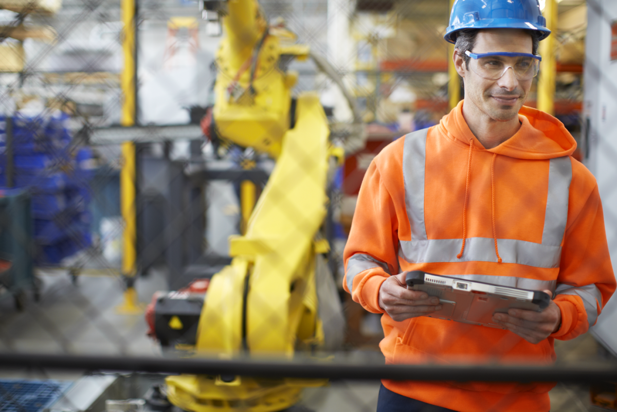 Manufacturing, Field Worker; Engineer holding tablet. Windows brand photography, featuring Panasonic ToughPad