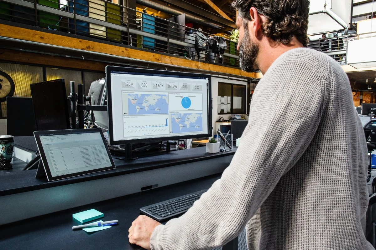 Operations manager working at standing desk