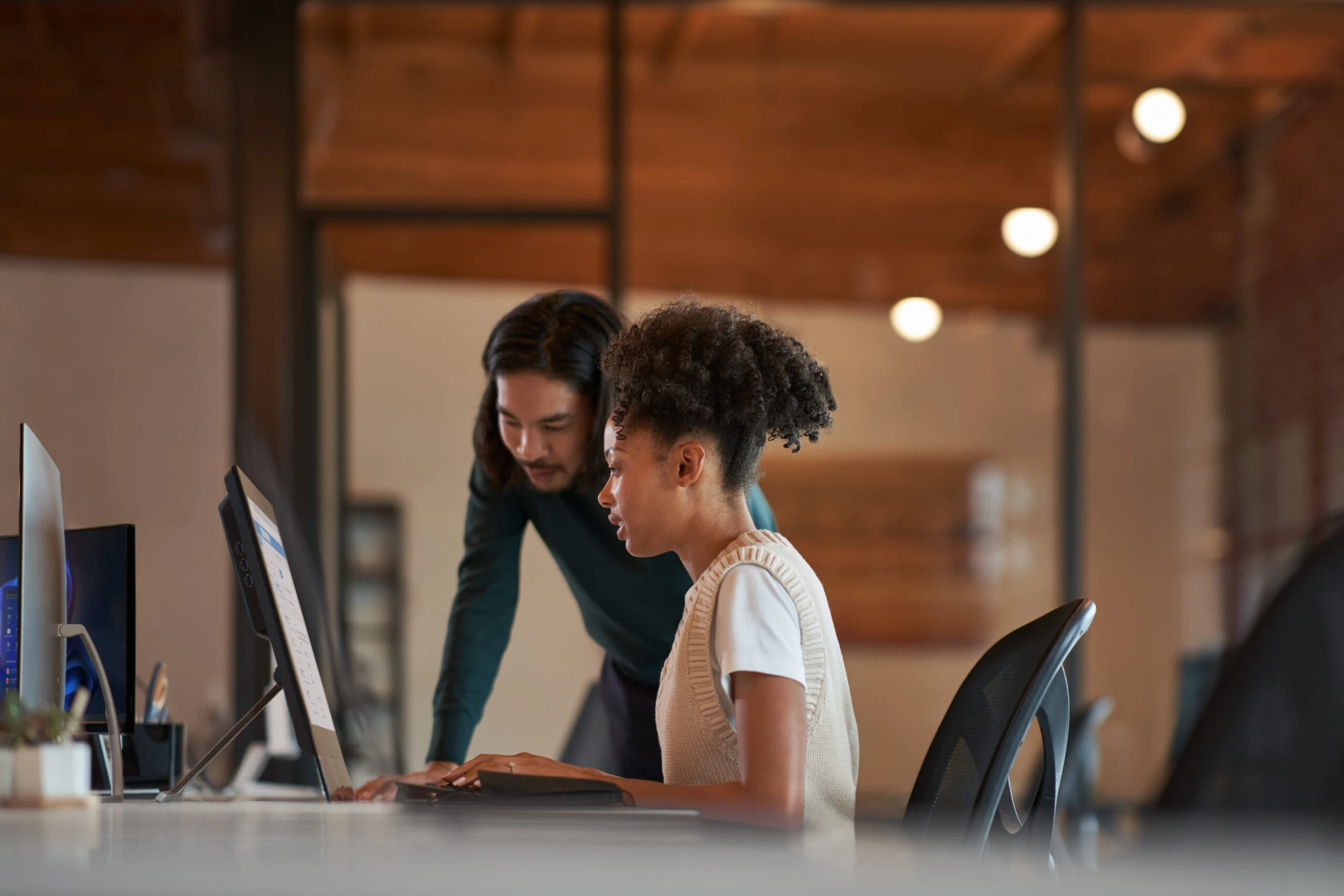 Enterprise office workers collaborating in an open work space