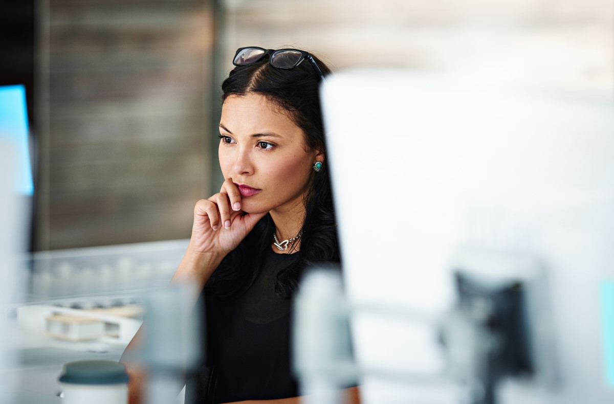 Woman concentrating at a workstation