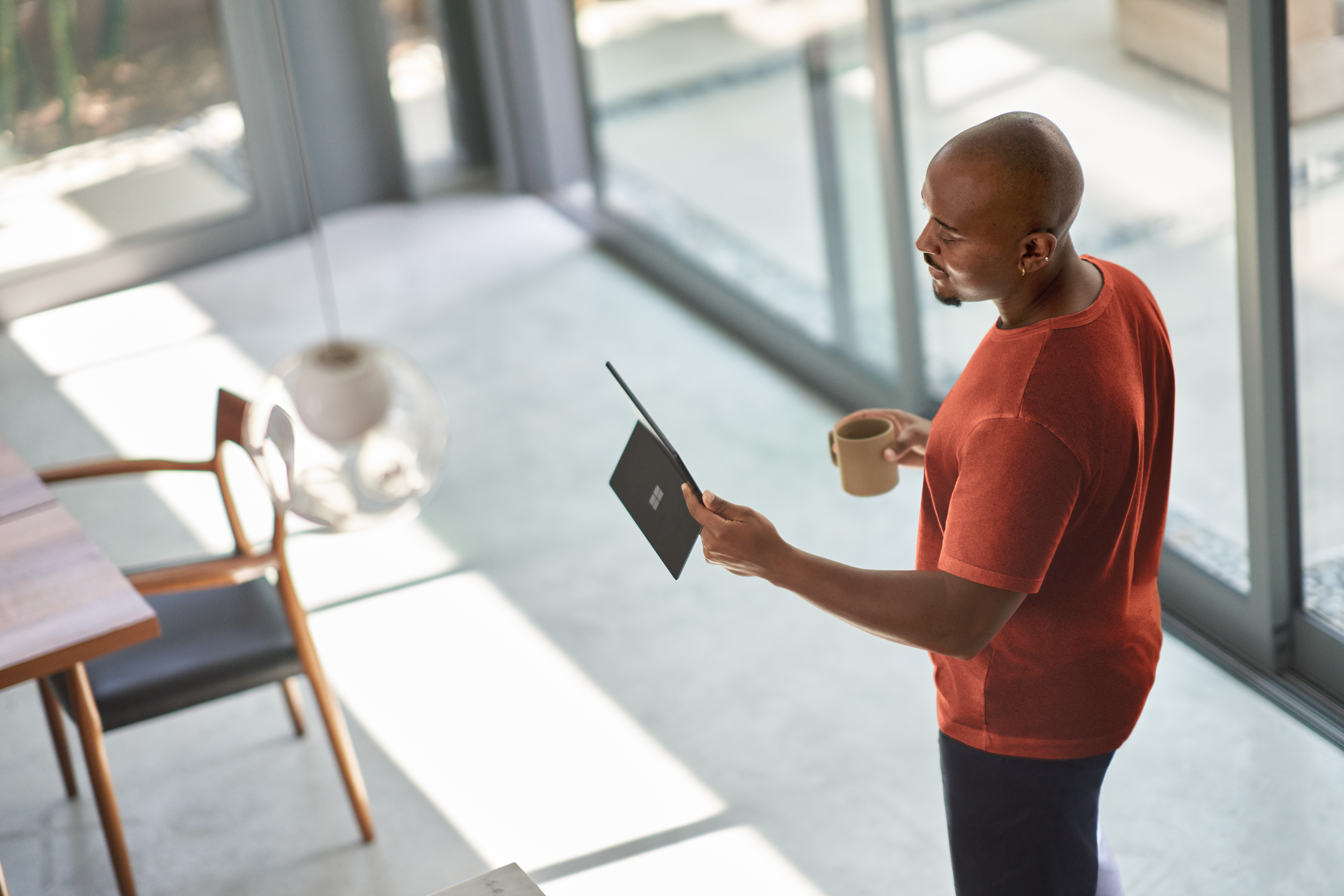 Photo of a seller taking a sales call on a laptop