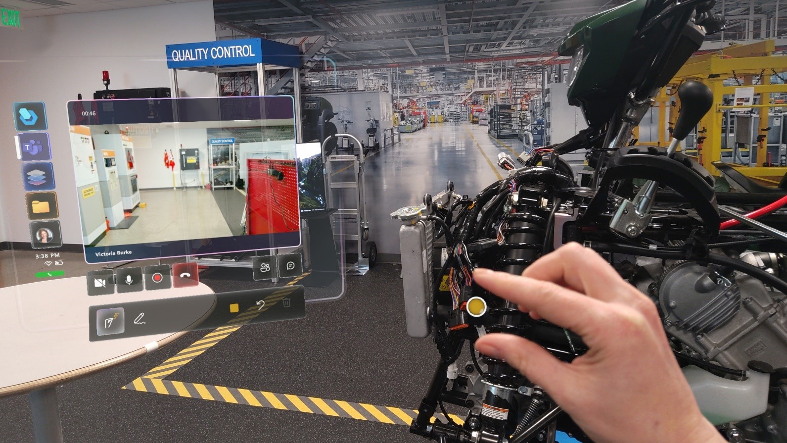 Photo of a mixed reality view of a guide to repairing factory equipment as seen by a HoloLens user