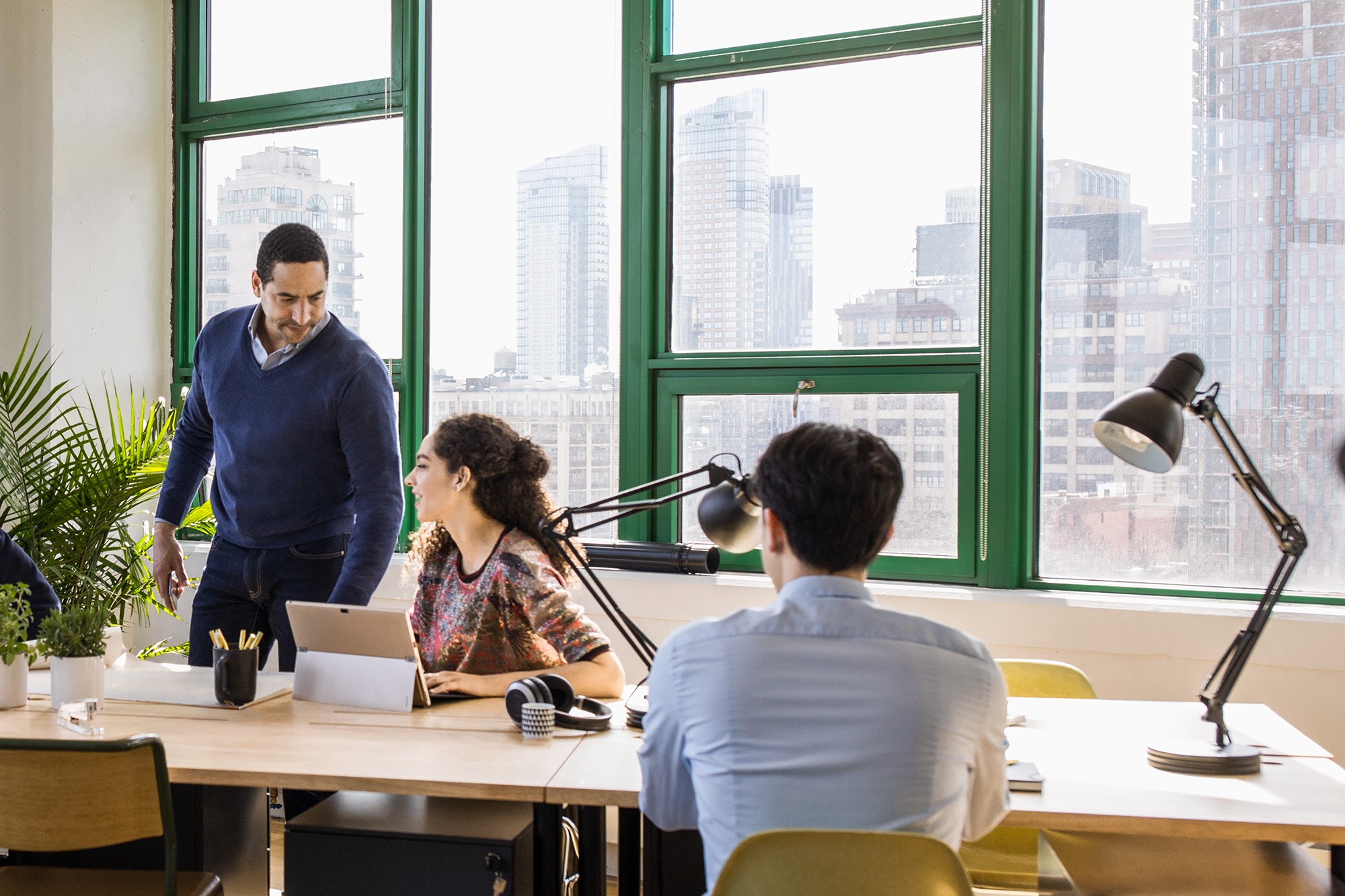 Small business team collaborating in modern workplace