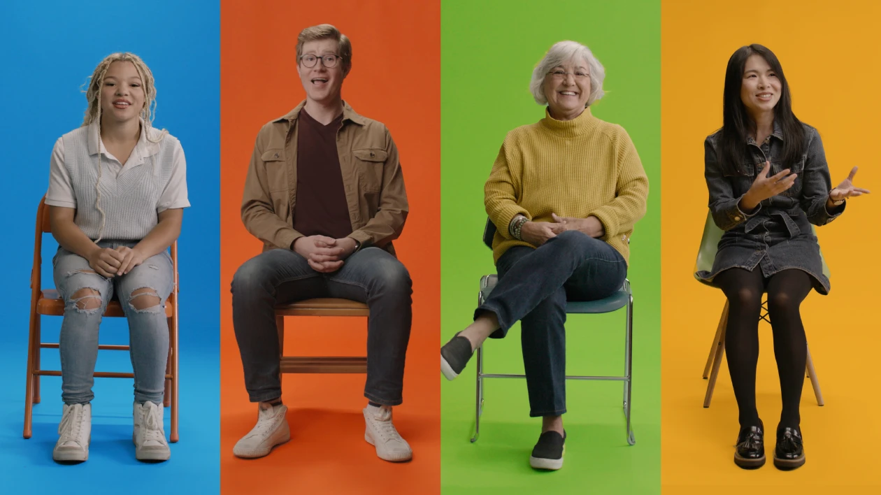 Four people sitting on chairs and telling stories for World Teachers Day 2024