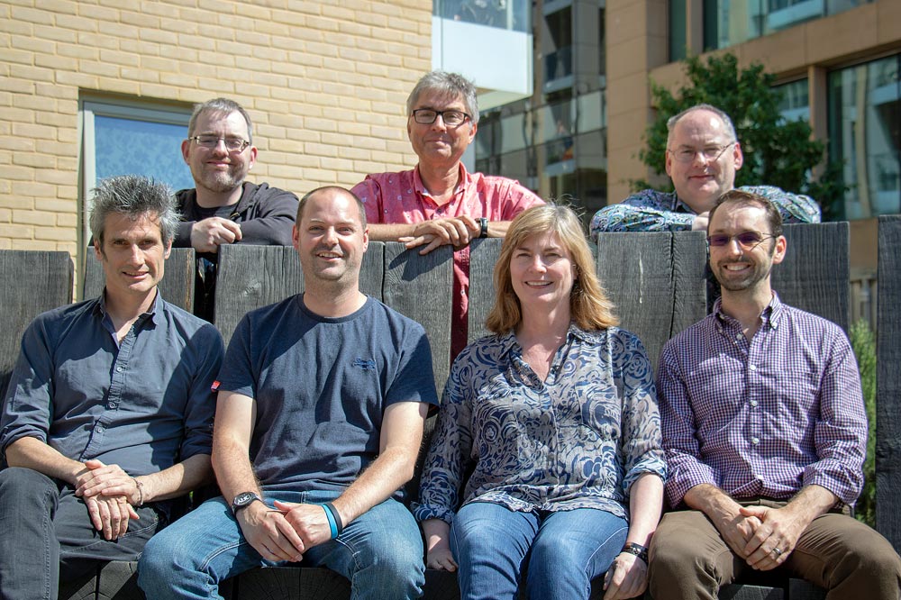 Six people posing for a photo