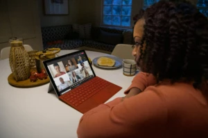 A woman working from home on a Teams call