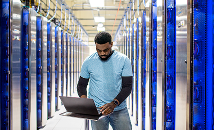 Image of an IT professional in a datacenter