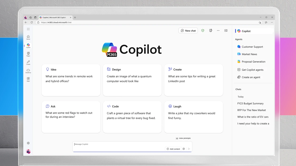 A monitor screen showing the Microsoft 365 Copilot landing page. Behind the monitor is a horizontal stripe that is blue and magenta gradient; the image is gray on the top and bottom