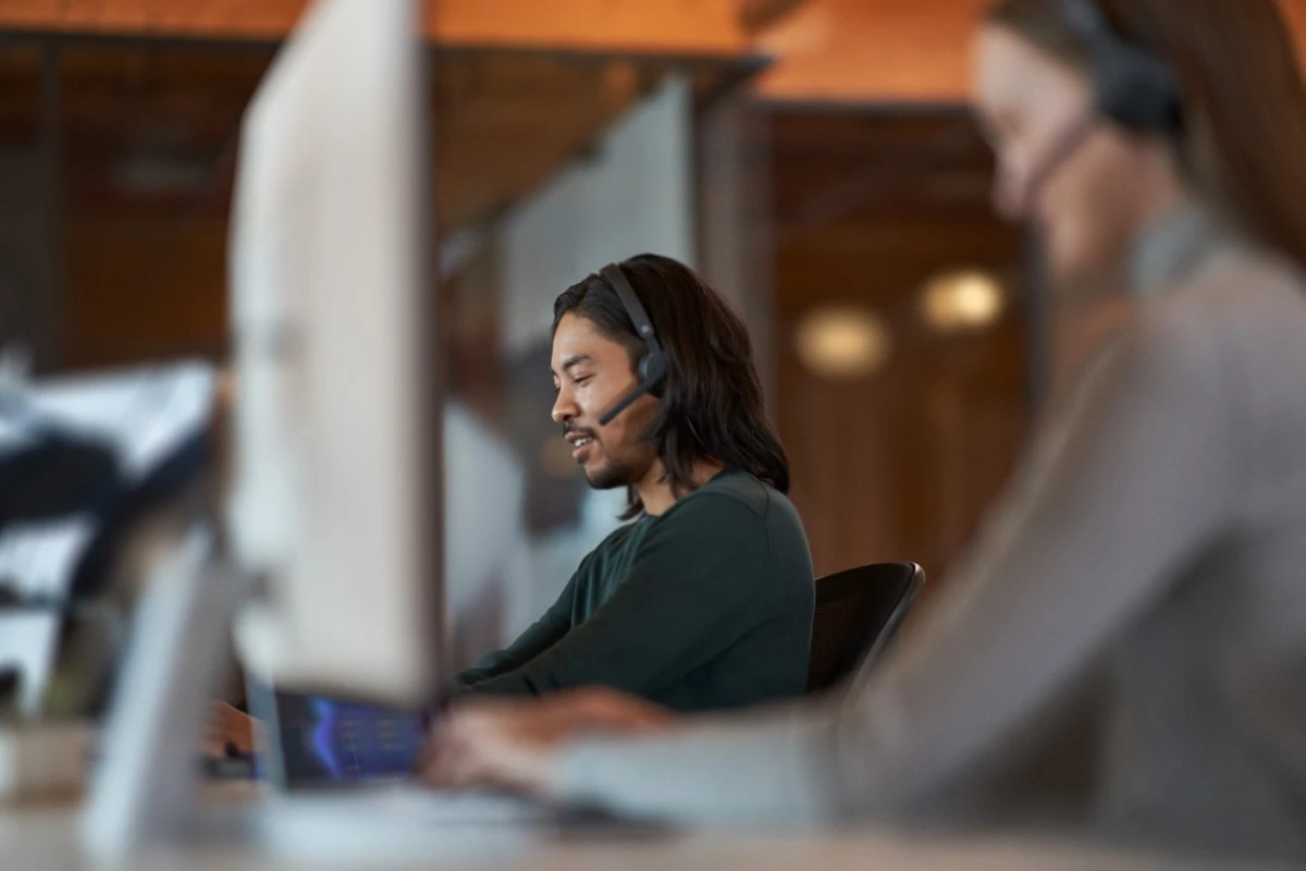 Customer service support team taking a call