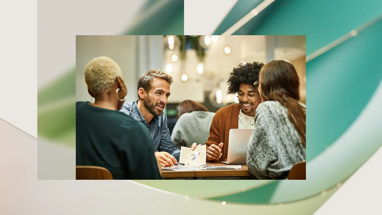A group of people having a discussion around a table