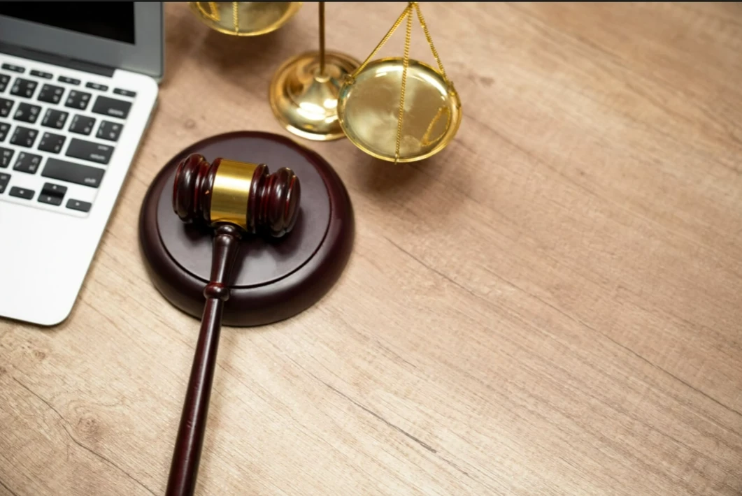 A gavel and scales on a desk AI-generated content may be incorrect