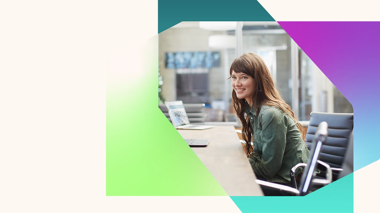 Developer in conference room meeting with abstract image in the background