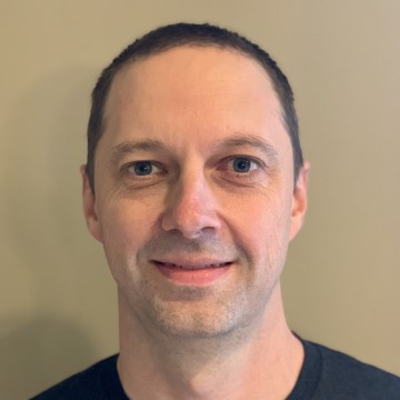Portrait de Clint Simon