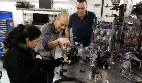 Kaoutar Benyahya, Kai Shi and Paolo Costa – Microsoft researchers on the team that developed the new MicroLED cabling system – with one of the prototypes they used to develop the technology.