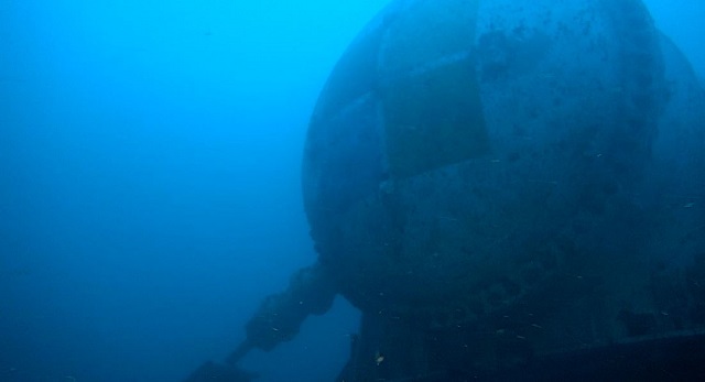 The pressure vessel on the seafloor during deployment as seen from a survey ROV.