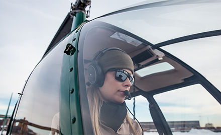 Image of a woman in a helicopter