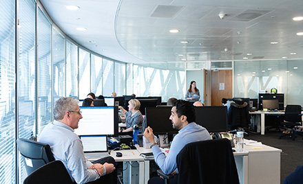 Image of a bustling tech office