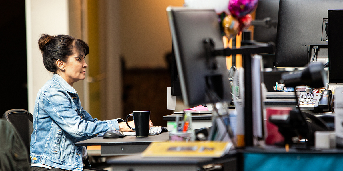 Image of a security worker in her office