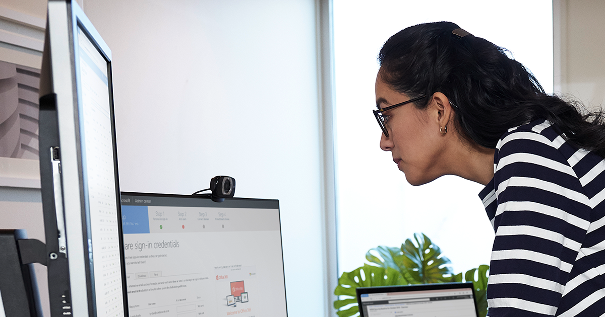 Image of a remote worker on her desktop PC