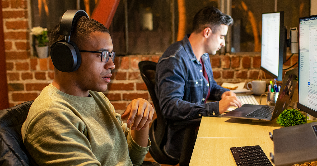 Two men at PC workstations