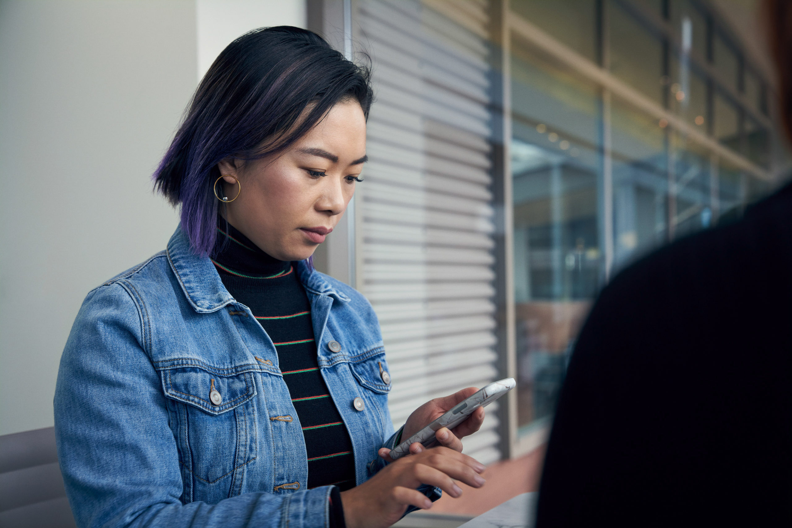 Woman reading message on her phone