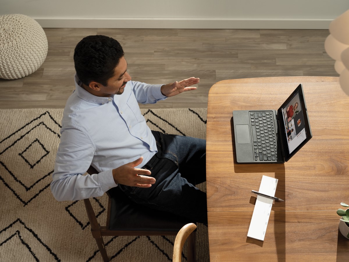 Male teacher with online class with Acer TravelMate B311 2-in-1