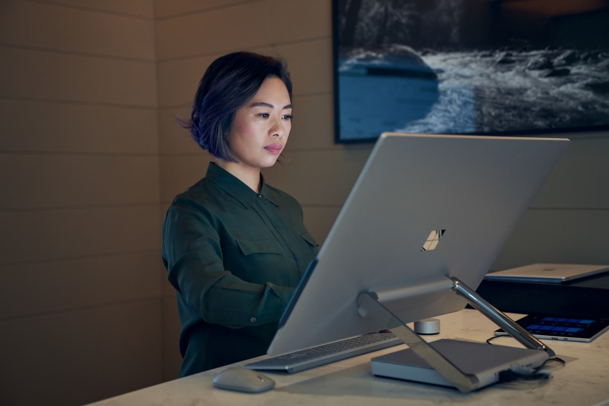 Adult female working on desktop monitor