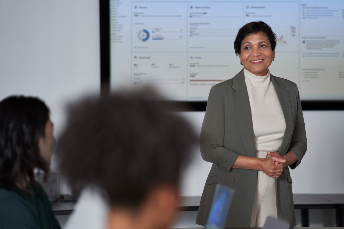 C I S O presents to the board of executives on security topics in a conference room setting