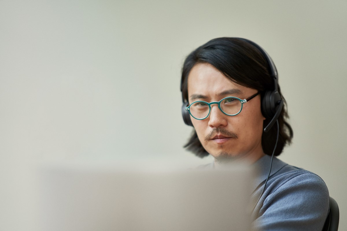 Security practitioner working from home and collaborating in remote call