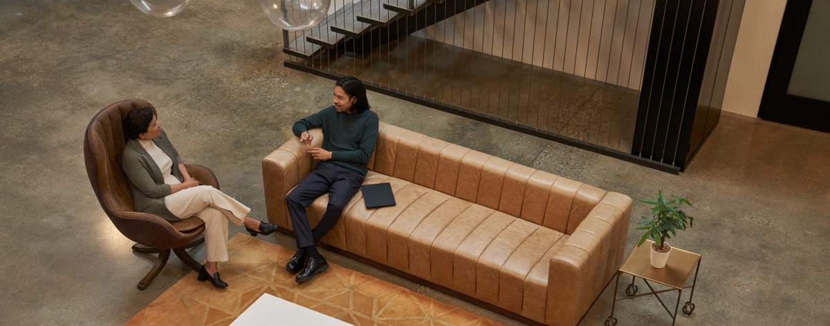 Decision maker (DM) collaborating in an open, casual space