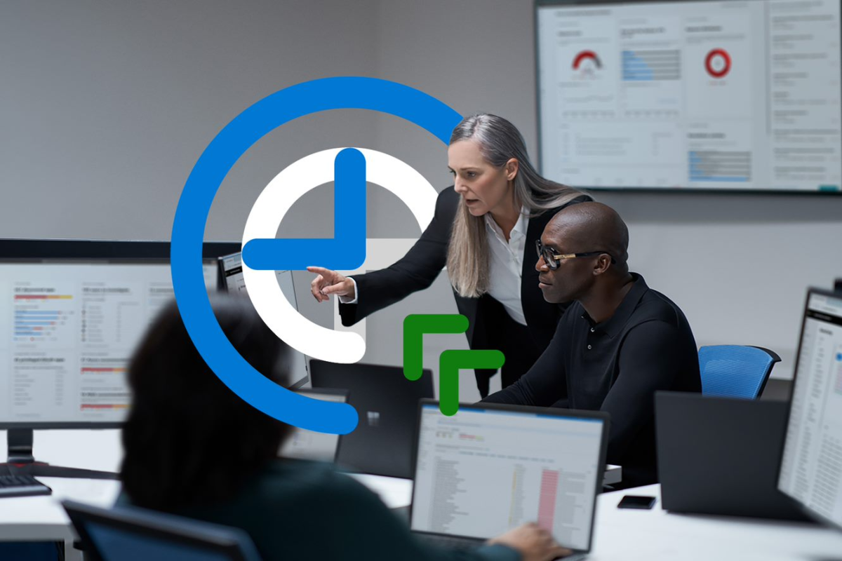 Chief information security officer collaborating with a practitioner in a security operations center