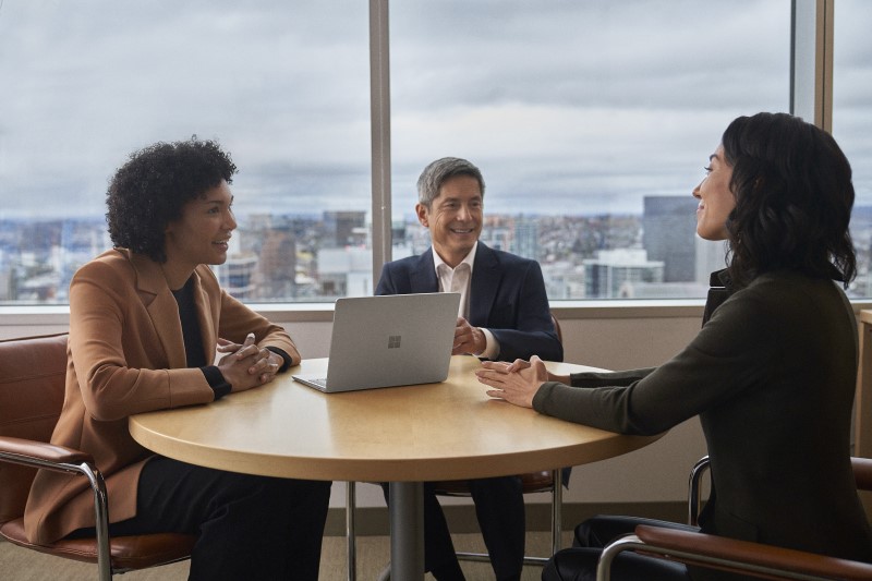Hybrid employees collaborating on a shared device