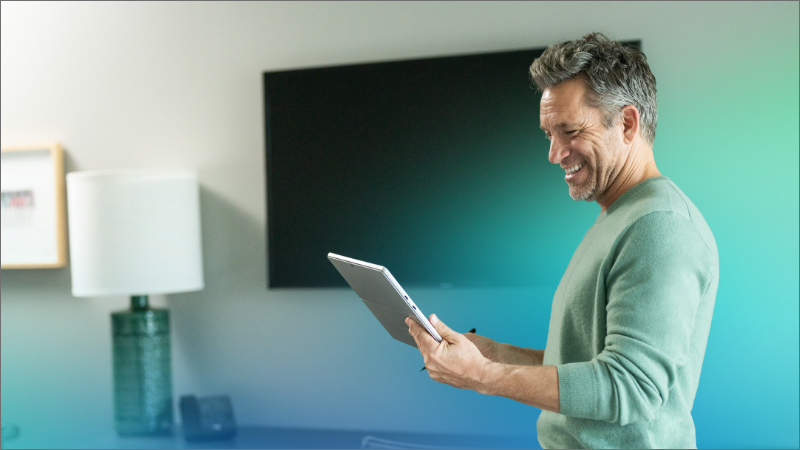 A man holding a tablet