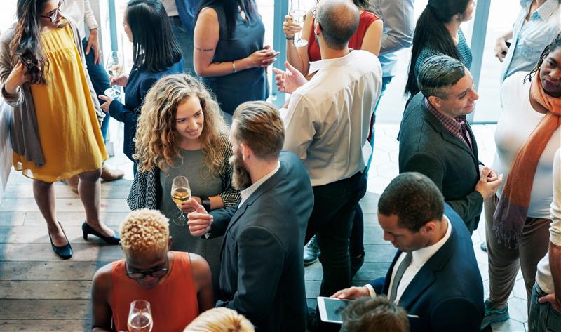 Attendees mingling at a conference