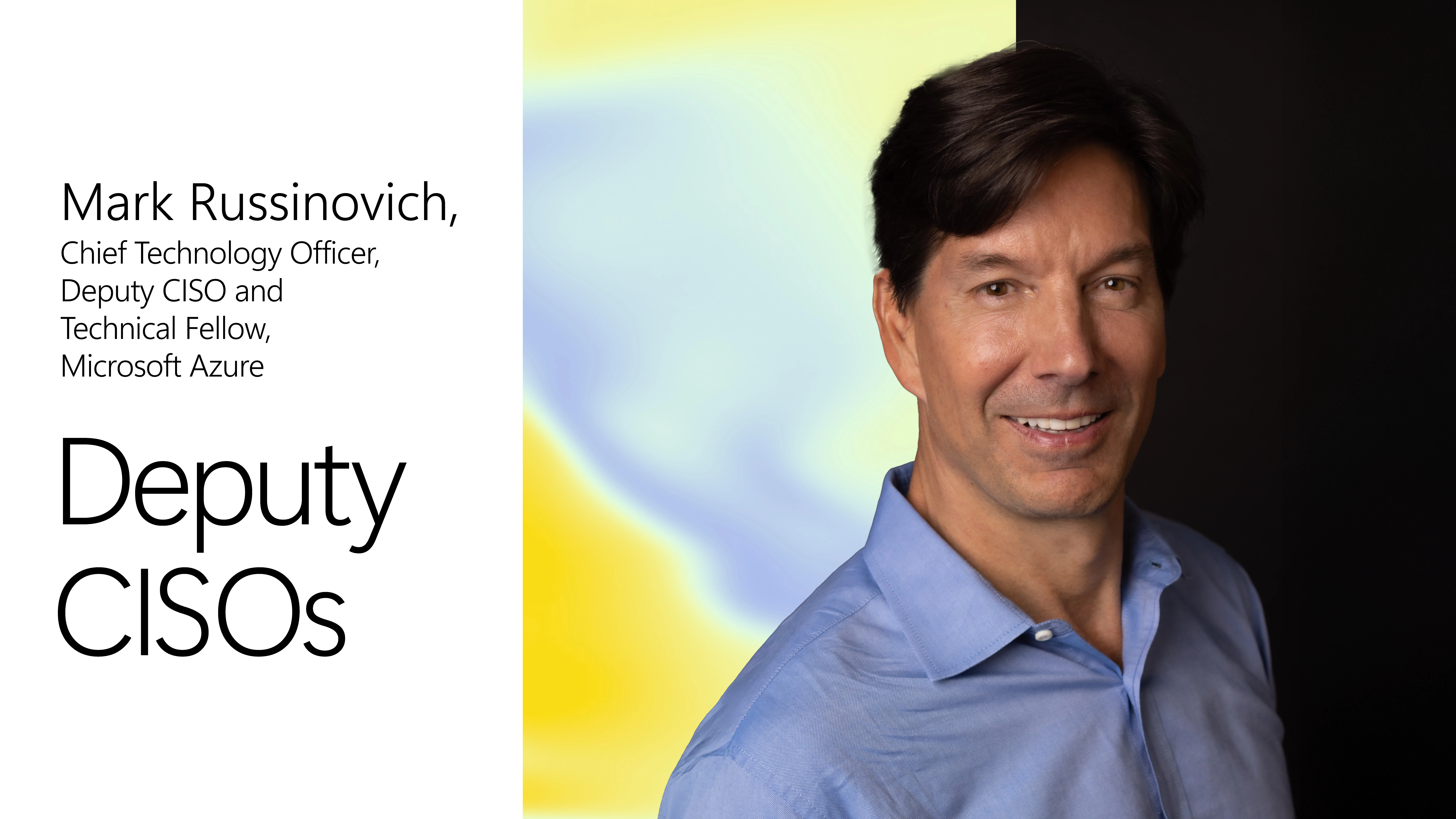 A man in a blue shirt with yellow and blue background and black text