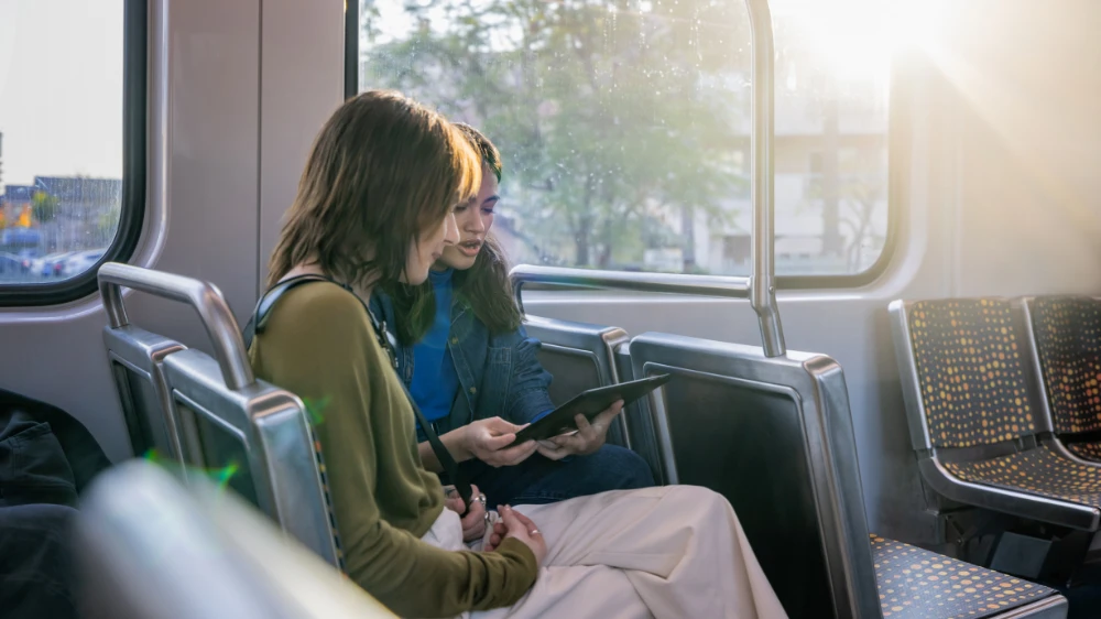 Students in focused work on the bus