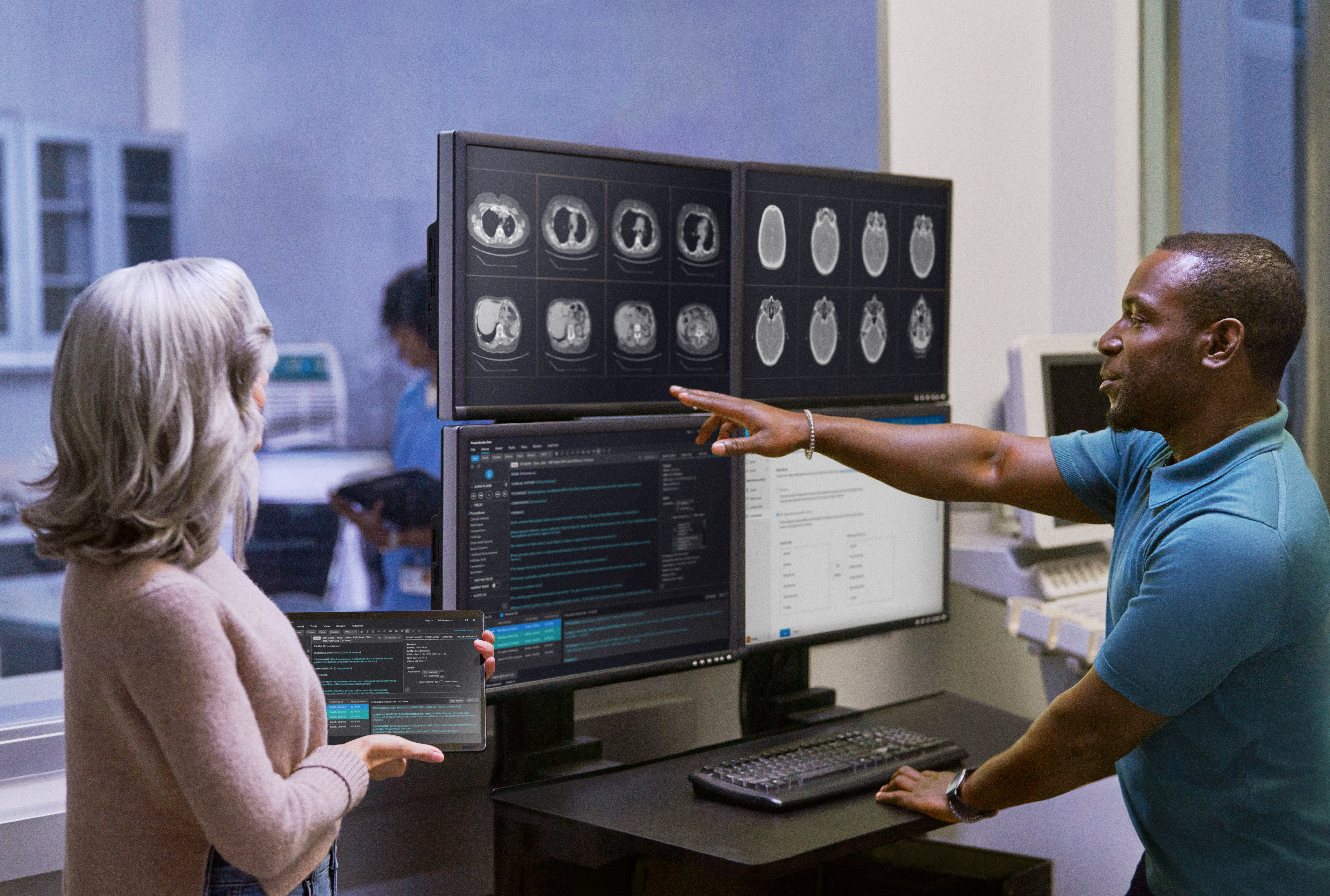 Clinicians looking at medical scans